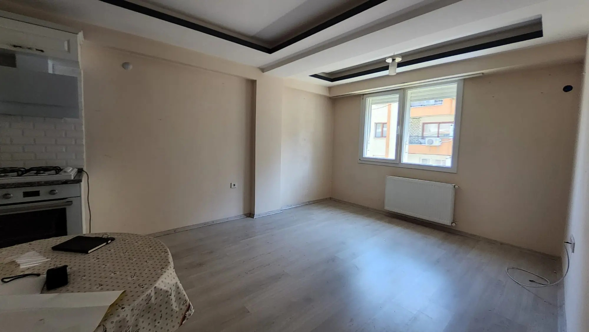 BAYRAKLI'DA GÜNEŞİ VE KONFORU BİR ARADA SUNAN 2+1 SATILIK DAİRE